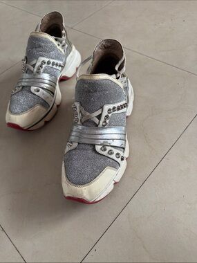 Christian Louboutin silver glitter slip on sneakers